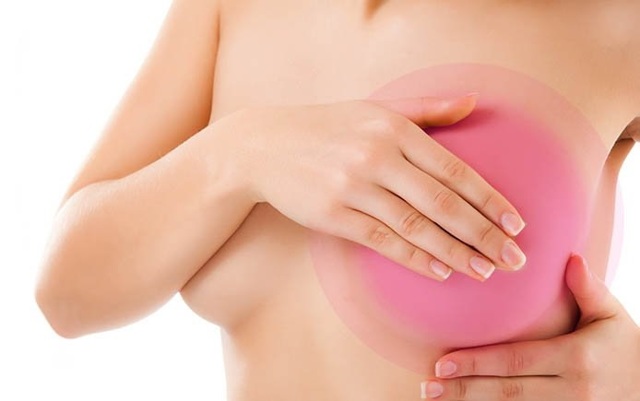 Почему болит грудь после овуляции